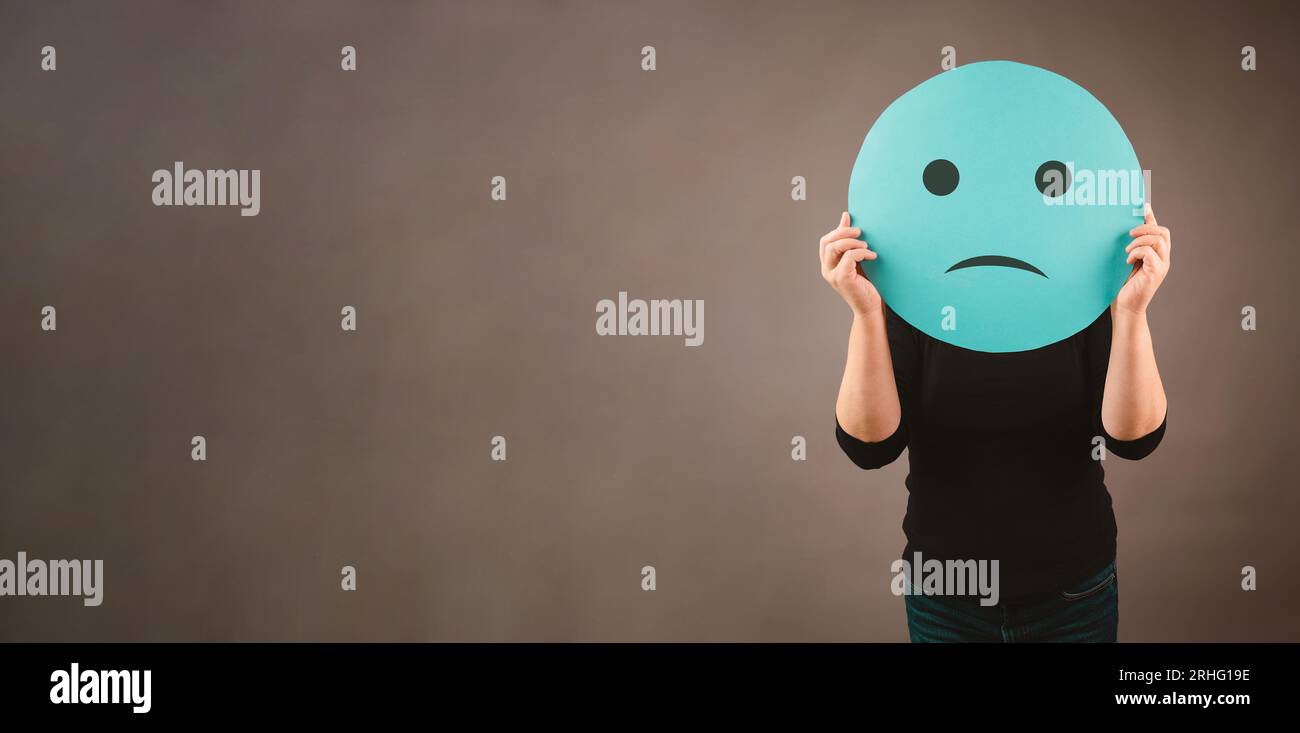Trauriges Gesicht, Konzept der psychischen Gesundheit, negative Emotionen, Depressionen, Stress und Druck Stockfoto