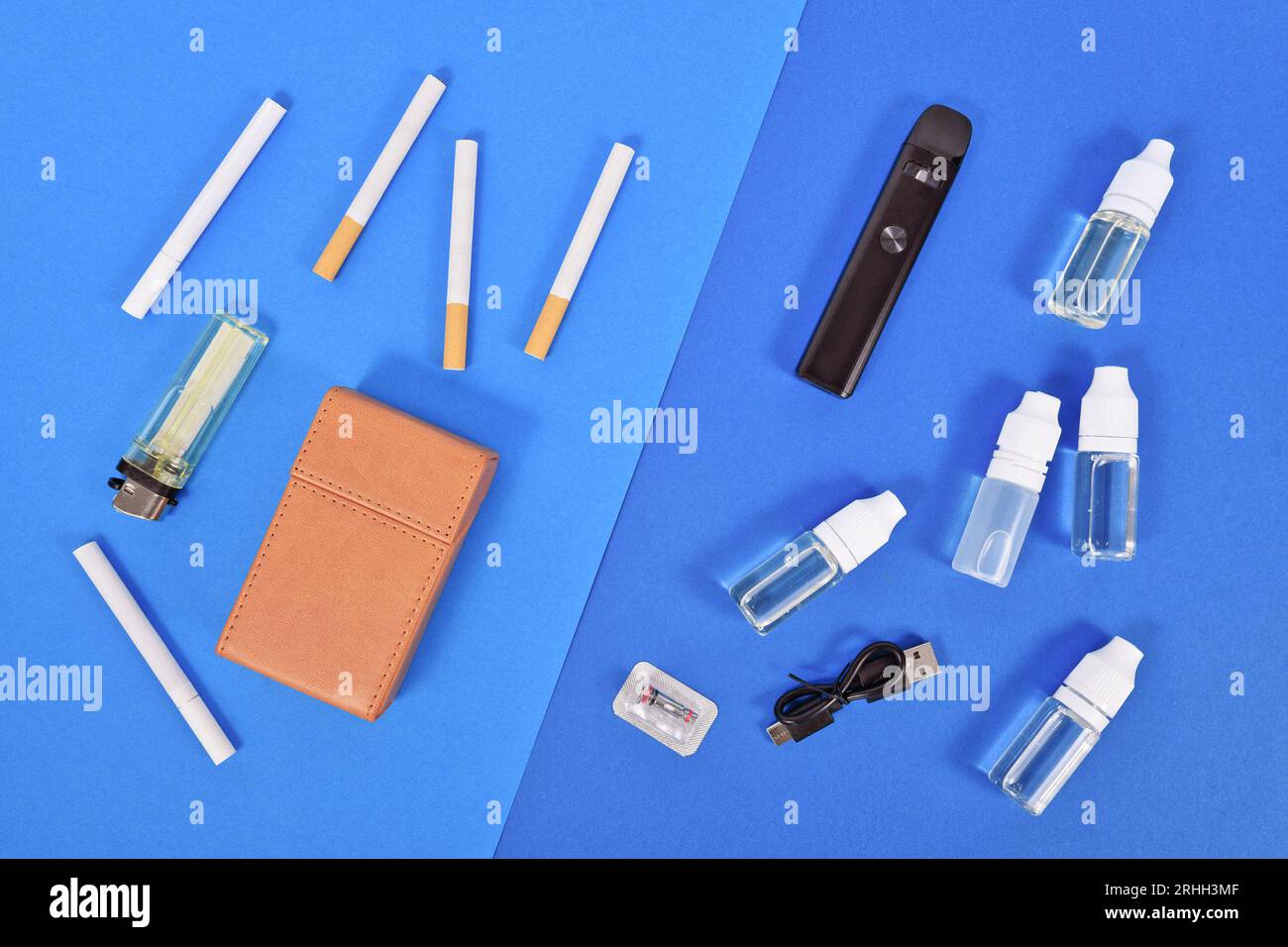 Vergleich zwischen elektronischer und echter Zigarette mit Werkzeugen Stockfoto