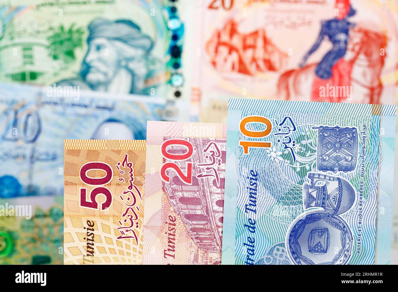 Tunesisches Geld - Dinar ein geschäftlicher Hintergrund Stockfoto