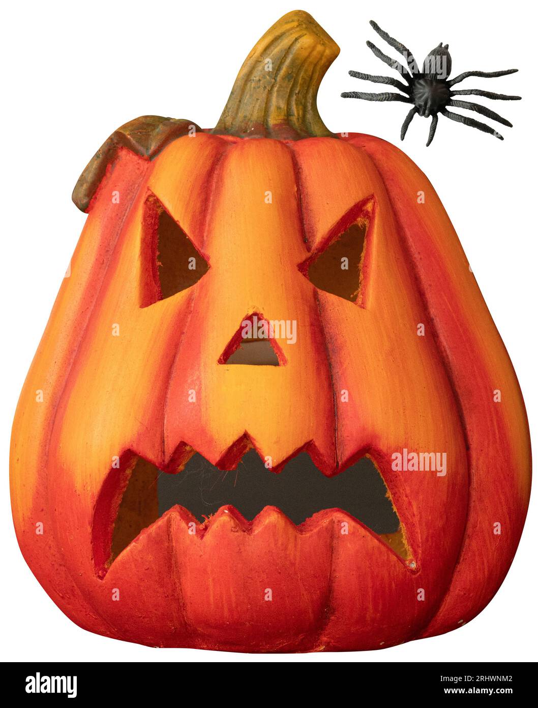 Gruseliger Kürbiskopf und Spinne. Beide sind auf weißem Hintergrund isoliert. Halloween-Dekoration. Stockfoto