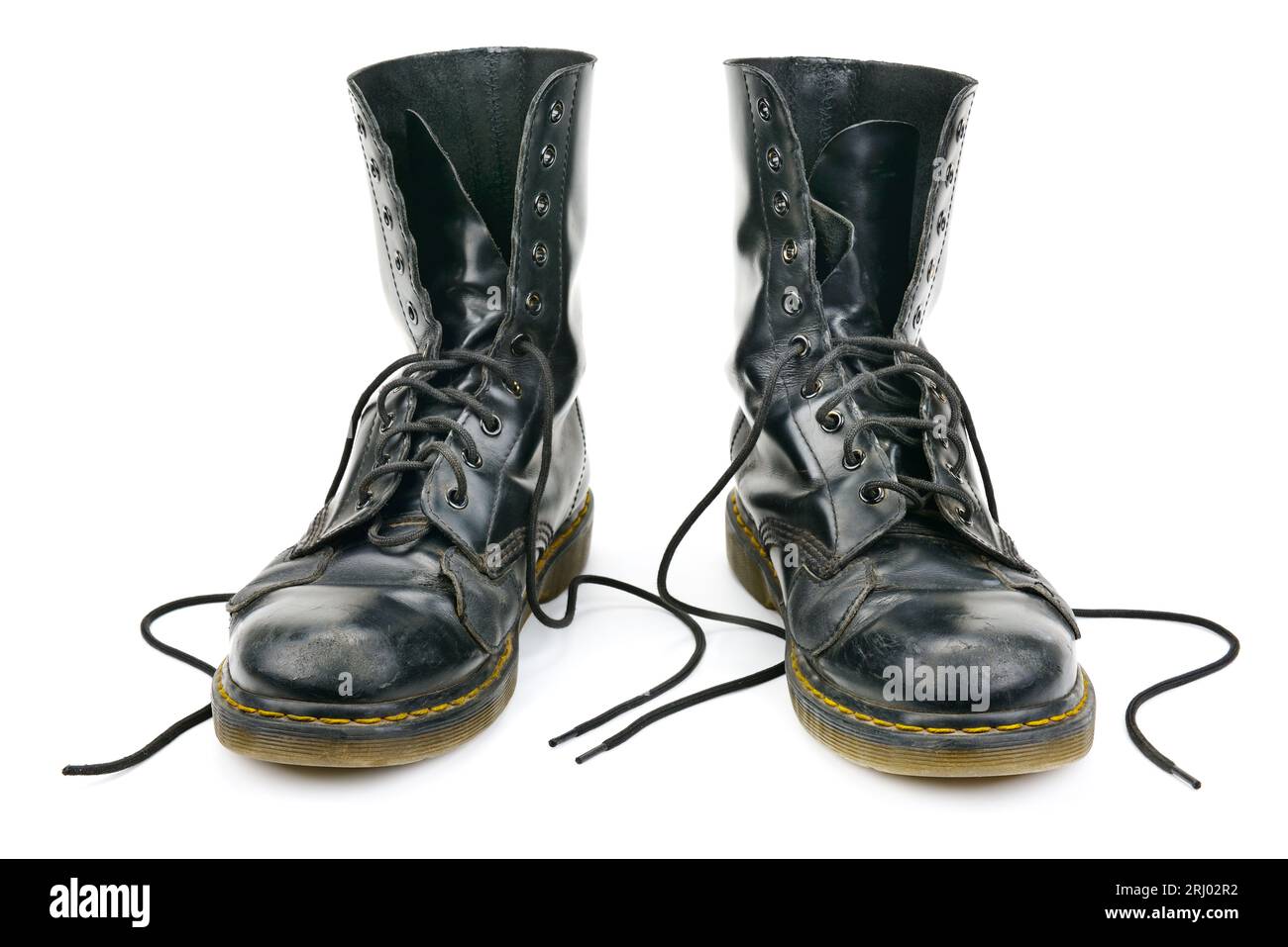 Abgenutzte Stiefel isoliert auf weißem Hintergrund Stockfoto