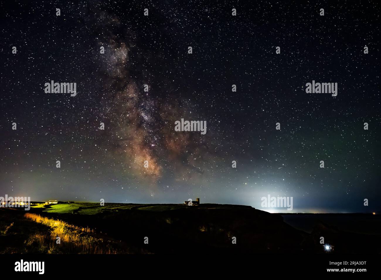 The summer Milky Way setting over St Materiana's Church, Tintagel, Cornwall, UK Stockfoto