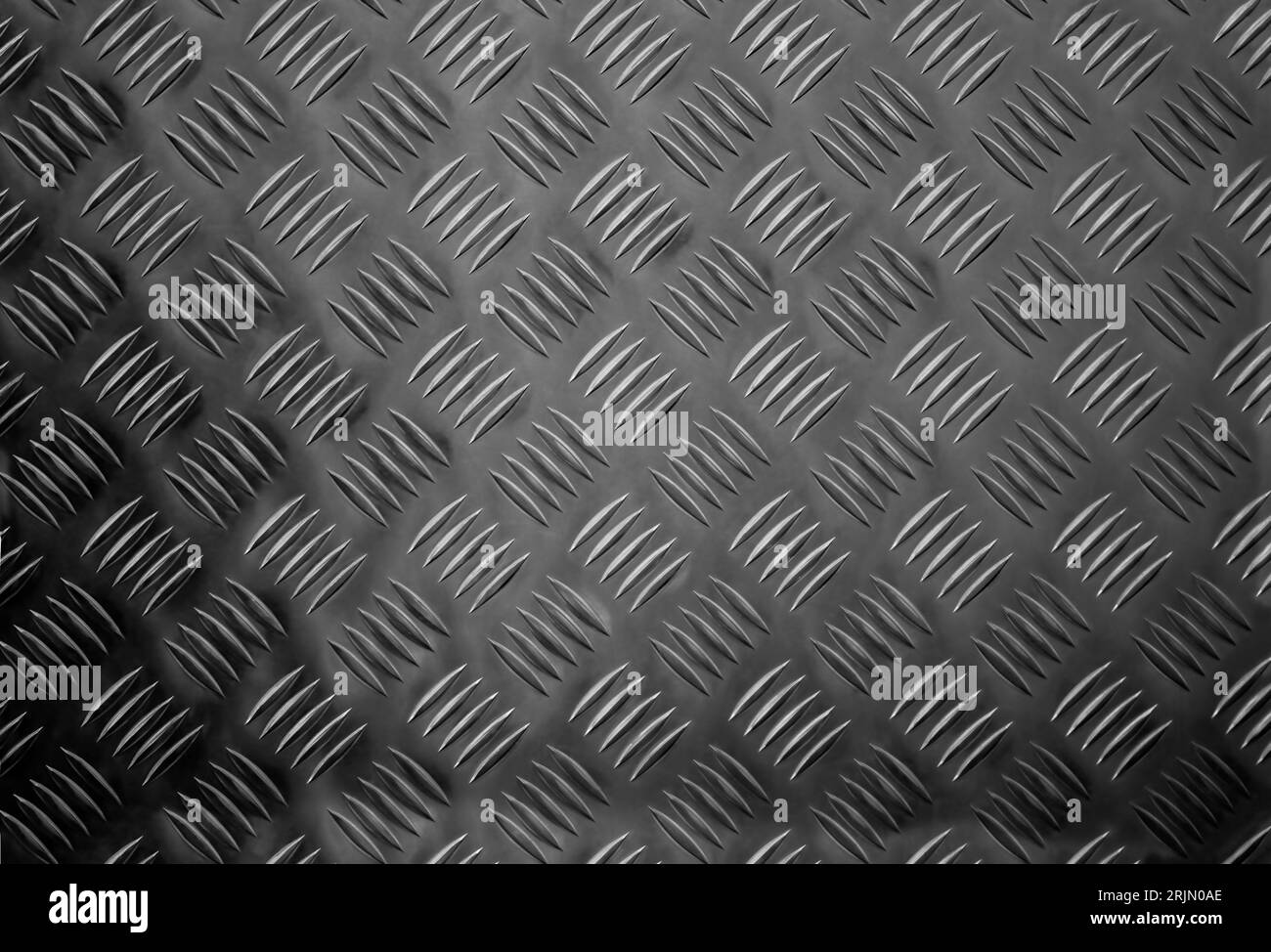 Schwarze Grunge-Metallplatte aus Stahl oder rostfreier Textur, leerer Hintergrund oder alte schwarze Stahlstruktur mit Kratzern. Baukonzept. Stockfoto