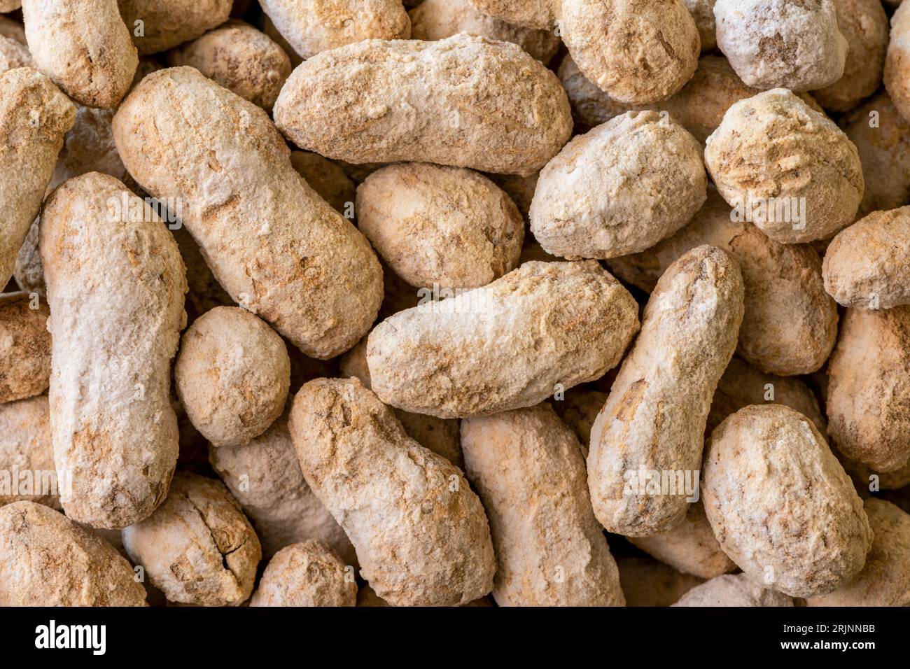 Eine Nahaufnahme von gesalzenen und gerösteten Erdnüssen Stockfoto