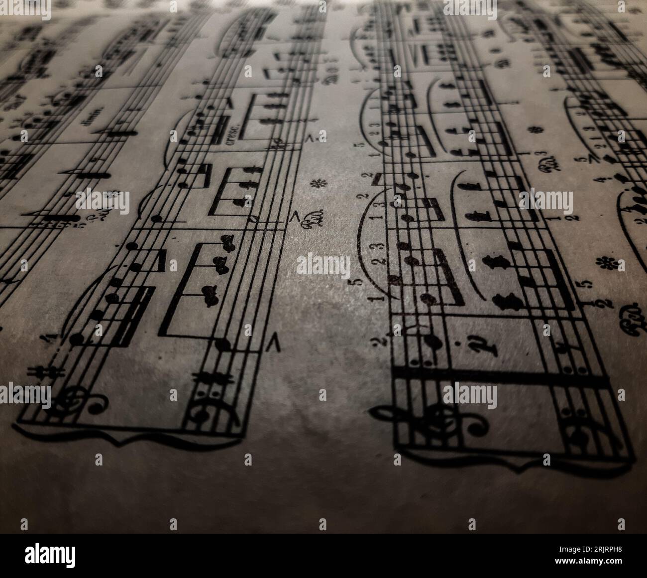 Eine Nahaufnahme von Details auf einem Notenblatt mit Notizen Stockfoto