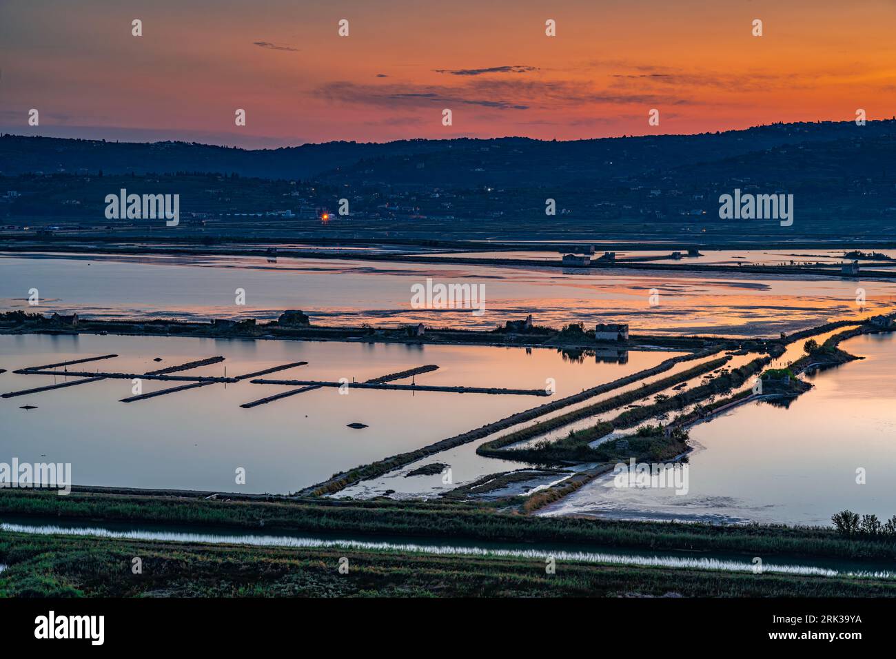 Salzpfannen bei Sonnenaufgang Stockfoto