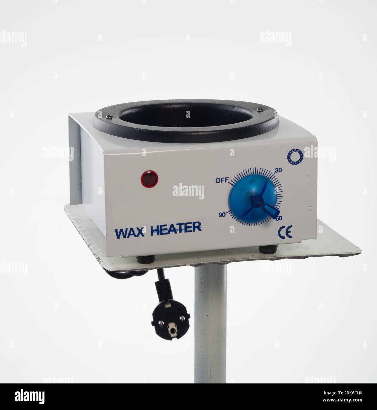 Wärmerer Warmwachsbereiter für Hart-, Streifen- und Paraffinwachs, Heizer für Wachsen Automatischer Heizer, Maschine, Automatisches Wachs-Kit isolierter weißer Hintergrund. Stockfoto