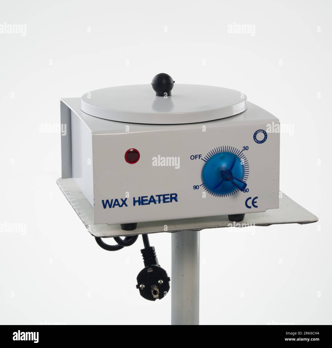 Wärmerer Warmwachsbereiter für Hart-, Streifen- und Paraffinwachs, Heizer für Wachsen Automatischer Heizer, Maschine, Automatisches Wachs-Kit isolierter weißer Hintergrund. Stockfoto
