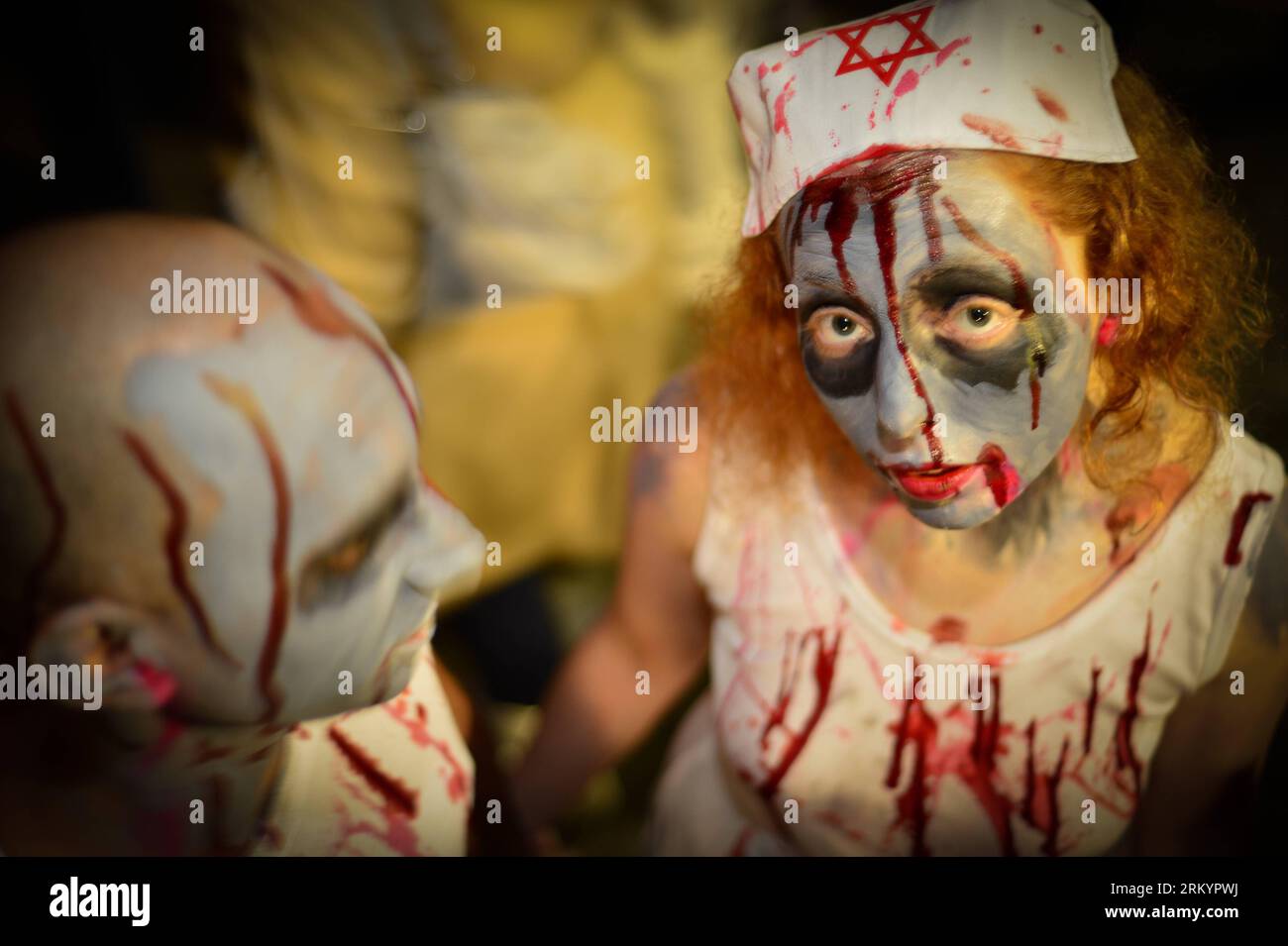 Bildnummer: 59263502 Datum: 23.02.2013 Copyright: imago/Xinhua (130223) -- Tel Aviv, Feb 23, 2013 (Xinhua) -- Israeli take part in Zombie Walk to celebrate Jewish Purim festival in Tel Aviv, Israel, on Feb. 23, 2013. Purim, one of Judaism s most colorful and popular holidays, was celebrated this year between sunset Saturday, 23 February, and sunset Sunday, 24 February, in most area of Israel. (Xinhua/Yin Dongxun) ISRAEL-TEL AVIV-ZOMBIE WALK PUBLICATIONxNOTxINxCHN Gesellschaft kurios Komik Verkleidung Horror Premiumd x0x xds 2013 quer 59263502 Date 23 02 2013 Copyright Imago XINHUA Tel Stockfoto