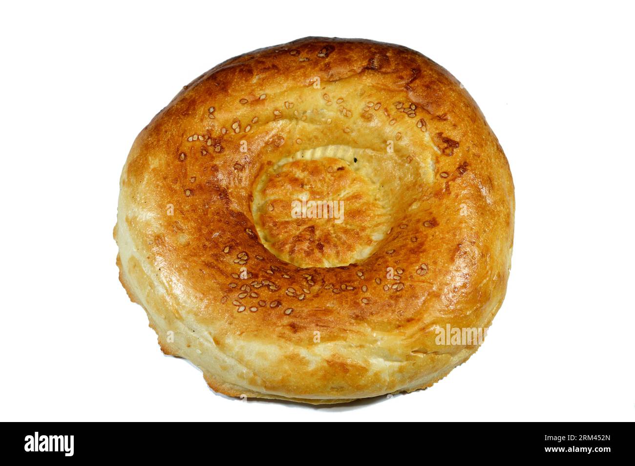 Tandyr nan usbekisches Brot, eine Art zentralasiatisches Brot, das oft mit Stempelmustern auf den Teig mit einem Brotstempel verziert wird, der als Chekich al bekannt ist Stockfoto
