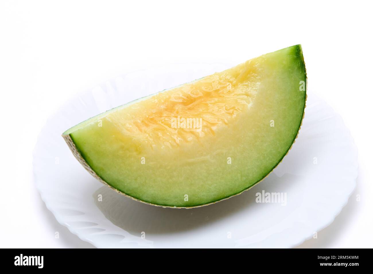 Earls Melone auf einem Teller geschnitten Stockfoto
