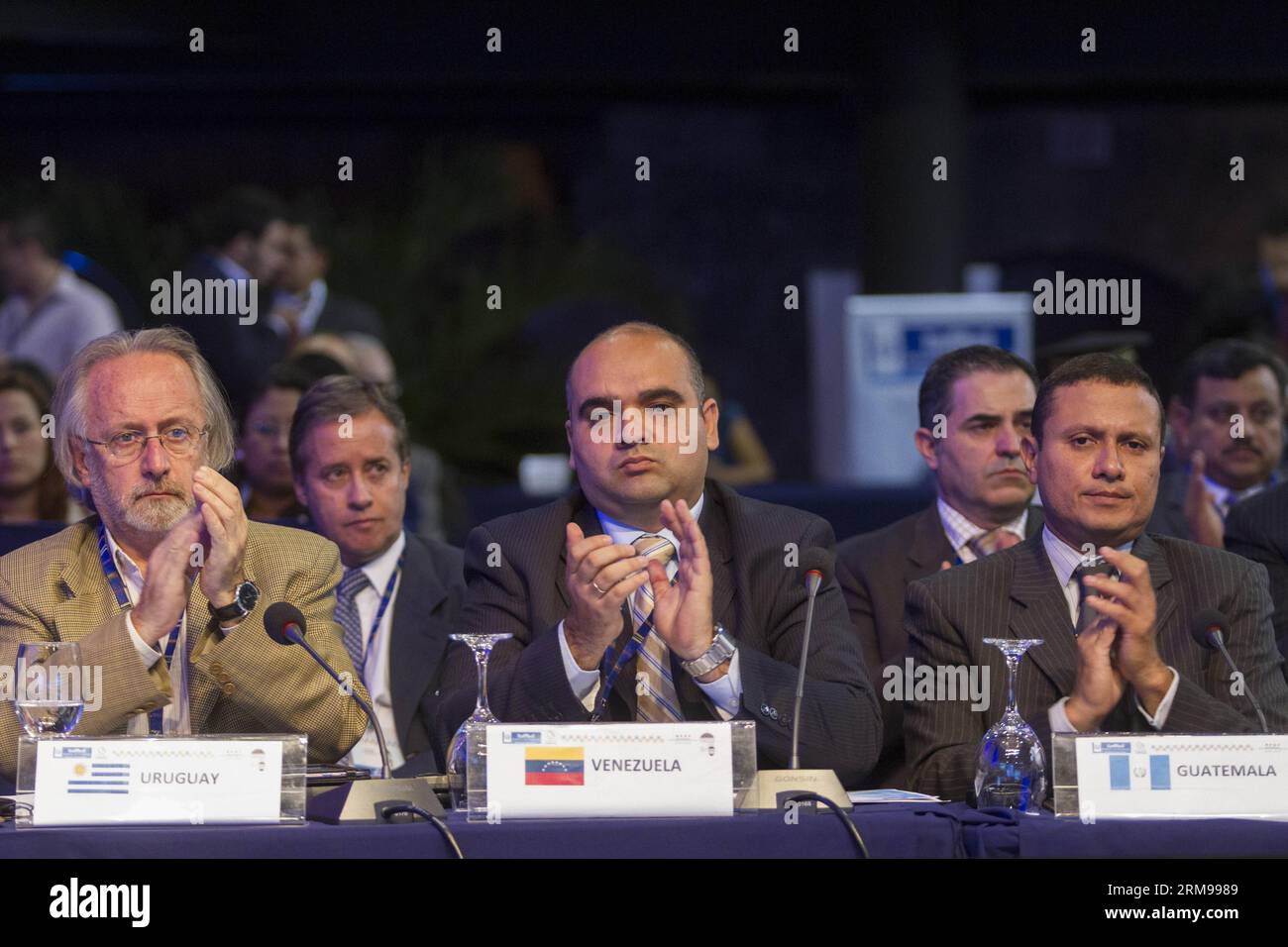 ANTIGUA GUATEMALA, May 13, 2014 - Julio Calzada (L), secretary general of the National Drugs Board of Uruguay, Raul Gonzalez (C) of Venezuela s National Anti-drug Office, and Raul Morales (R), Guatemala s deputy foreign minister, take part in the opening ceremony of the ministerial meeting on the world problem of drugs, in Antigua Guatemala, Guatemala, on May 13, 2014. CELAC ministers and representatives of public security attended the two-day meeting on the strategy against drugs and initiatives of response to this scourge. (Xinhua/Luis Echeverria) (ron) (sp) GUATEMALA-ANTIGUA GUATEMALA-ANTI- Stockfoto