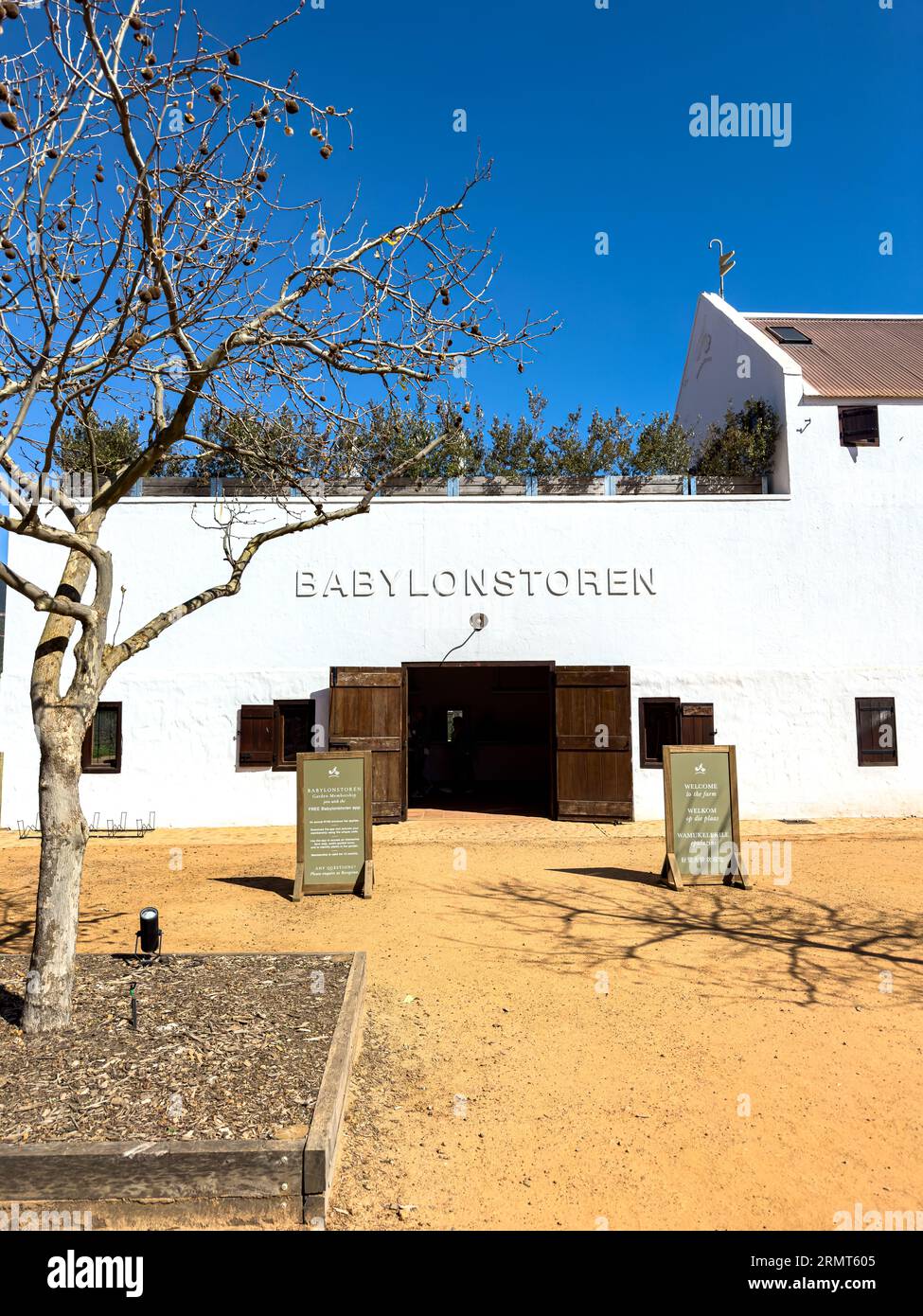 Babylonstoren ist eine der ältesten kapniederländischen Farmen. Es hat einen Obst- und Gemüsegarten mit 15 verschiedenen Clustern, Weinproben und verschiedenen Farmläden Stockfoto