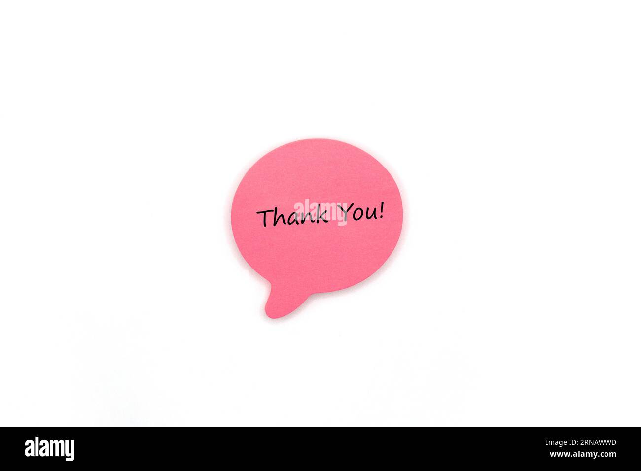 Pink Post it Note Speech Bubble with Hand written Thank you Text Stockfoto