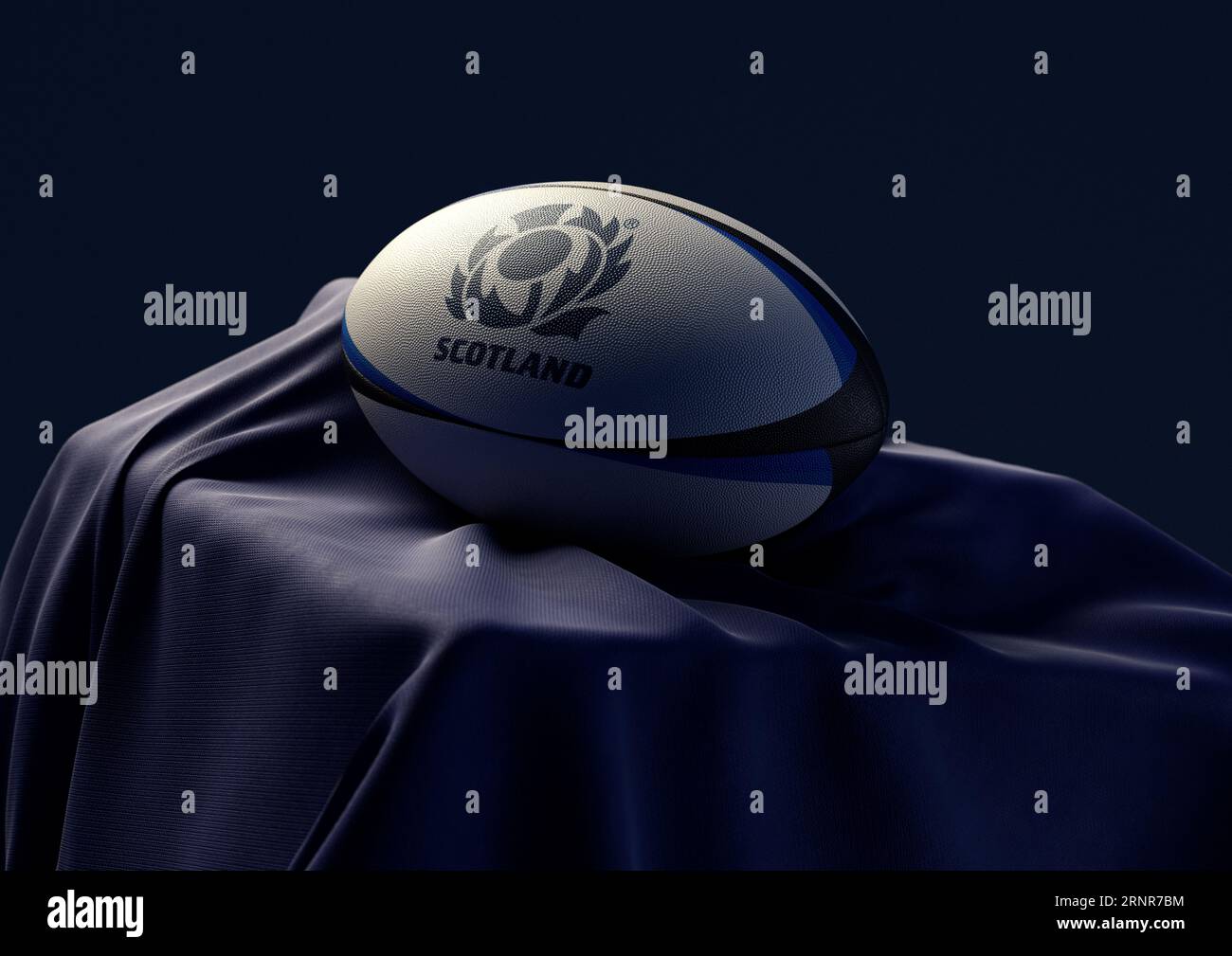 2. September 2023 - Bristol, Großbritannien: Ein 3D-Bild eines Rugby-Balls mit dem Aufdruck des schottischen Rugby-Logos auf einem drapierten blauen Stoff Stockfoto