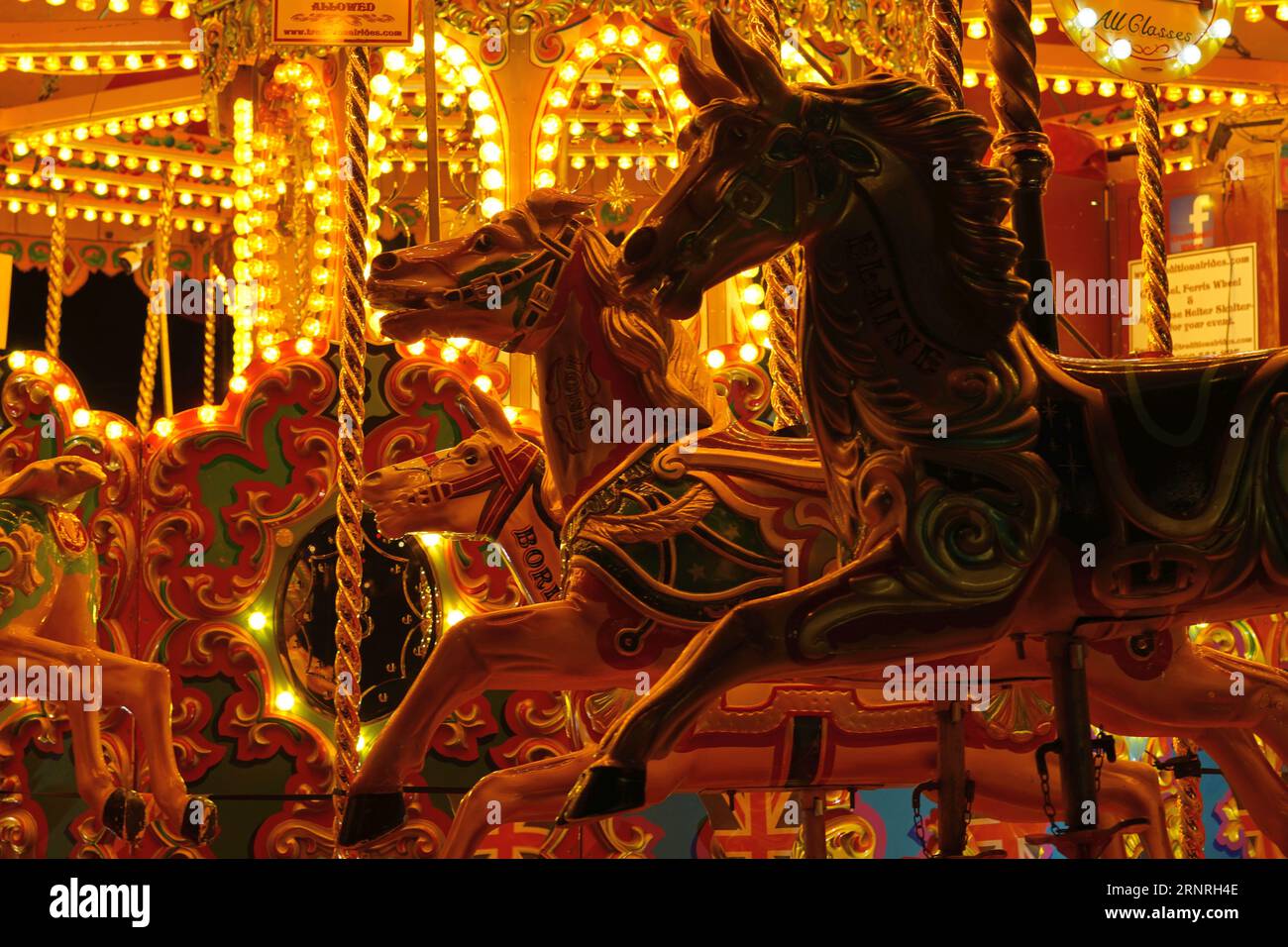 Pferde auf einem fröhlichen Rundgang, eine Fahrt auf dem britischen Messegelände Stockfoto