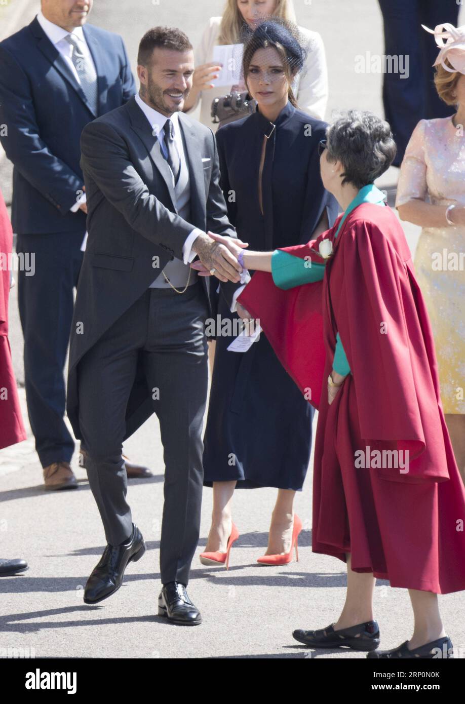 (180519) -- WINDSOR, 19. Mai 2018 () -- David Beckham (L, Front) und Victoria Beckham (C) kommen am 19. Mai 2018 zur Hochzeitszeremonie des britischen Prinzen Harry und der amerikanischen Schauspielerin Meghan Markle in Windsor (Großbritannien) in der St. George s Chapel in Windsor Castle an. Der britische Prinz Harry und die amerikanische Schauspielerin Meghan Markle haben den Knoten Samstag in St. George s Chapel in Windsor. () -- UK OUT BRITAIN-WINDSOR-ROYAL WEDDING XINHUA PUBLICATIONXNOTXINXCHN Stockfoto