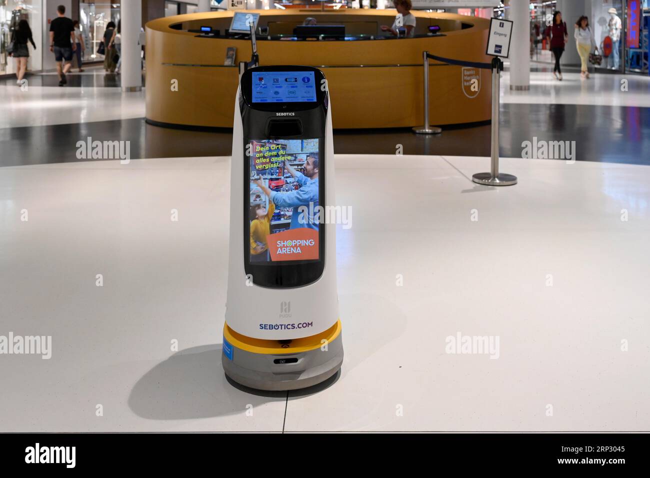 Selbstfahrender Werberoboter Shopping Center Information Digital Stockfoto