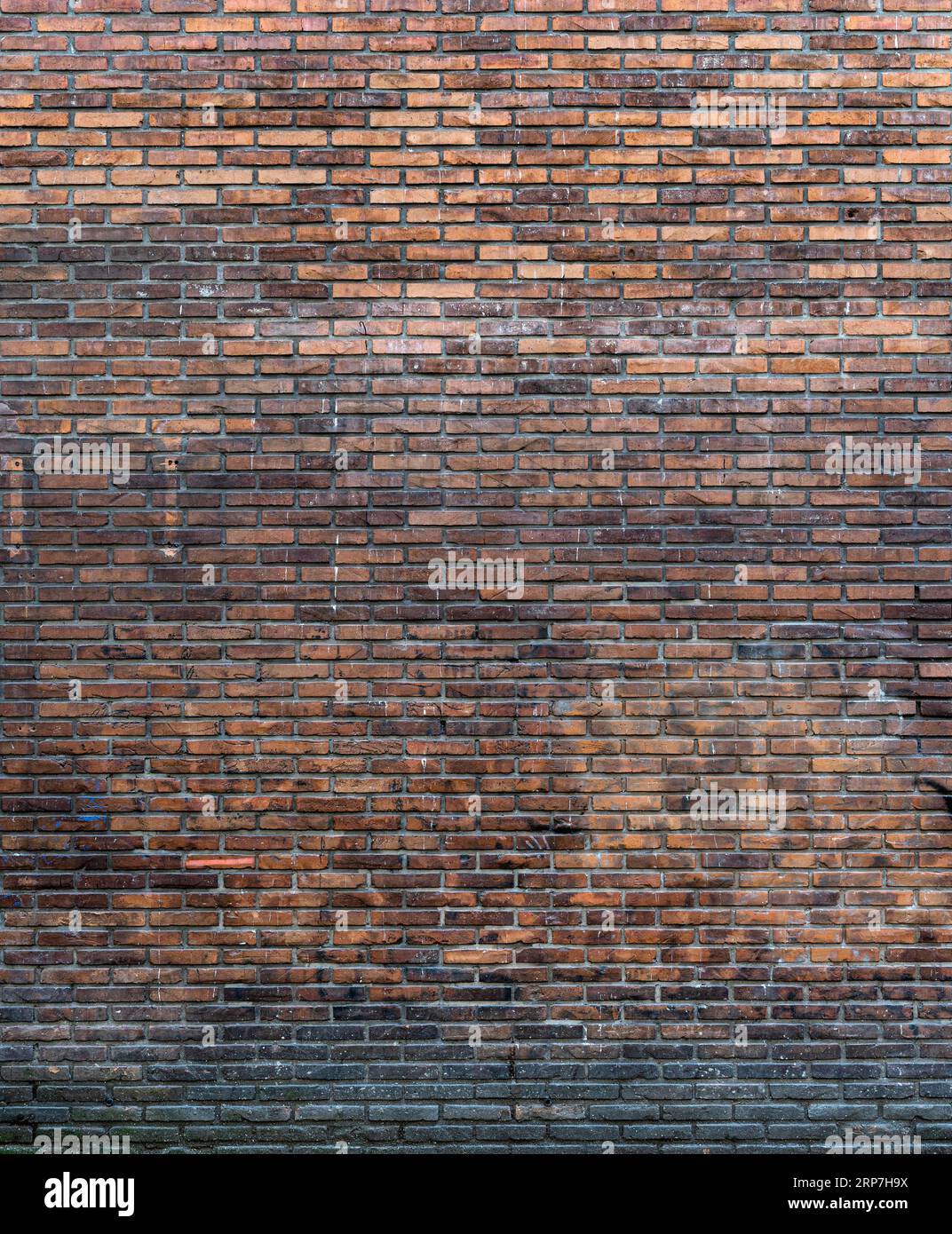 Rustikaler Backsteinmauerhintergrund Stockfoto