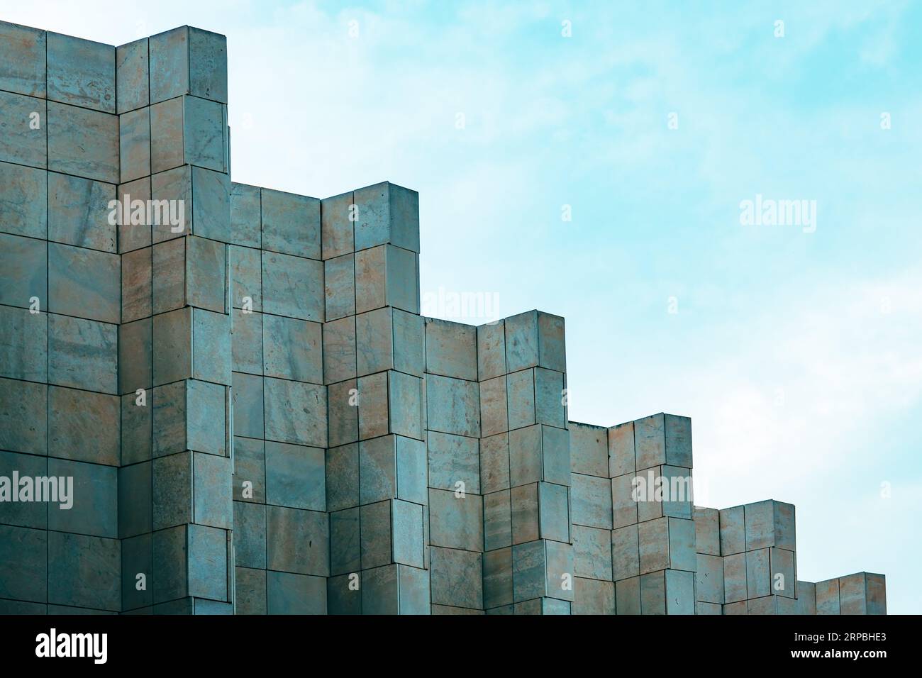 Marmorfliesenfassade mit großem Gebäude, Architektur und Bauindustrie Hintergrund Stockfoto
