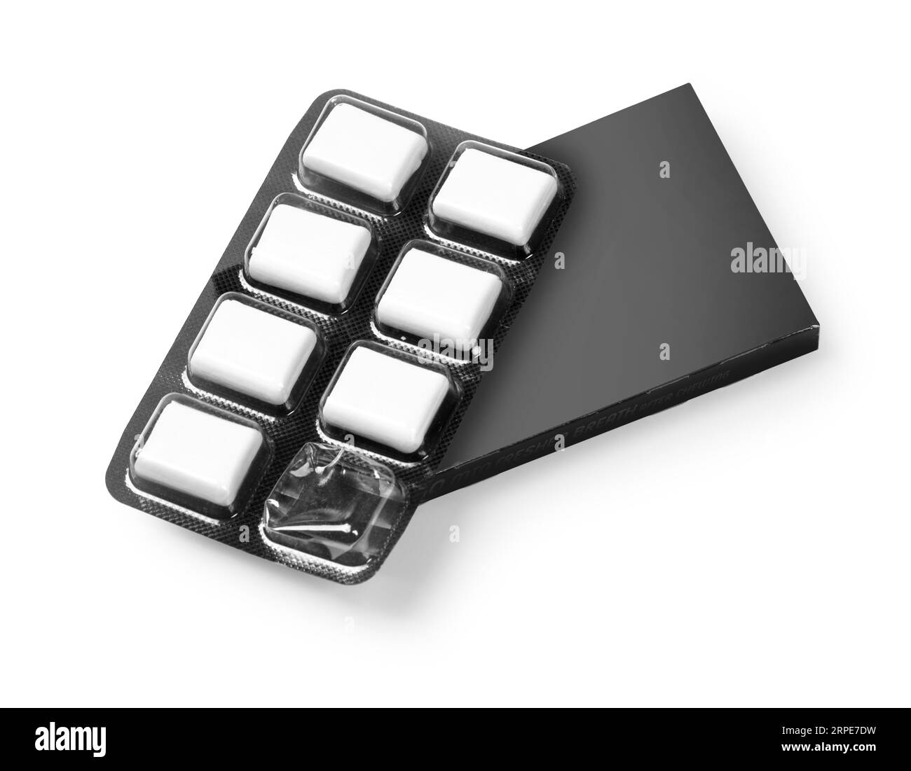 Schwarze Blisterpackung mit Kaugummi auf weißem Hintergrund, Draufsicht mit Beschneidungspfad Stockfoto