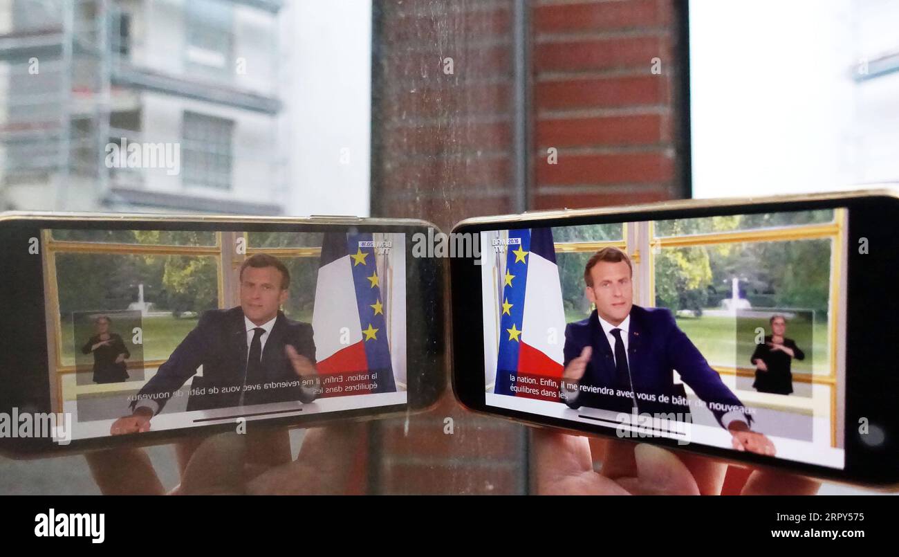 200615 -- PARIS, 15. Juni 2020 -- der französische Präsident Emmanuel Macron wird während einer Fernsehansprache in Paris, Frankreich, am 14. Juni 2020 abgebildet. In einer TV-Rede vor der Nation am Sonntag erklärte der französische Präsident Emmanuel Macron einen ersten Sieg über die Coronavirus-Epidemie und kündigte eine Rückkehr zur Normalität ab Montag in allen französischen Regionen an, mit Ausnahme von Überseegebieten. FRANCE-PARIS-COVID-19-RECOVERY-NOMALCY GaoxJing PUBLICATIONxNOTxINxCHN Stockfoto