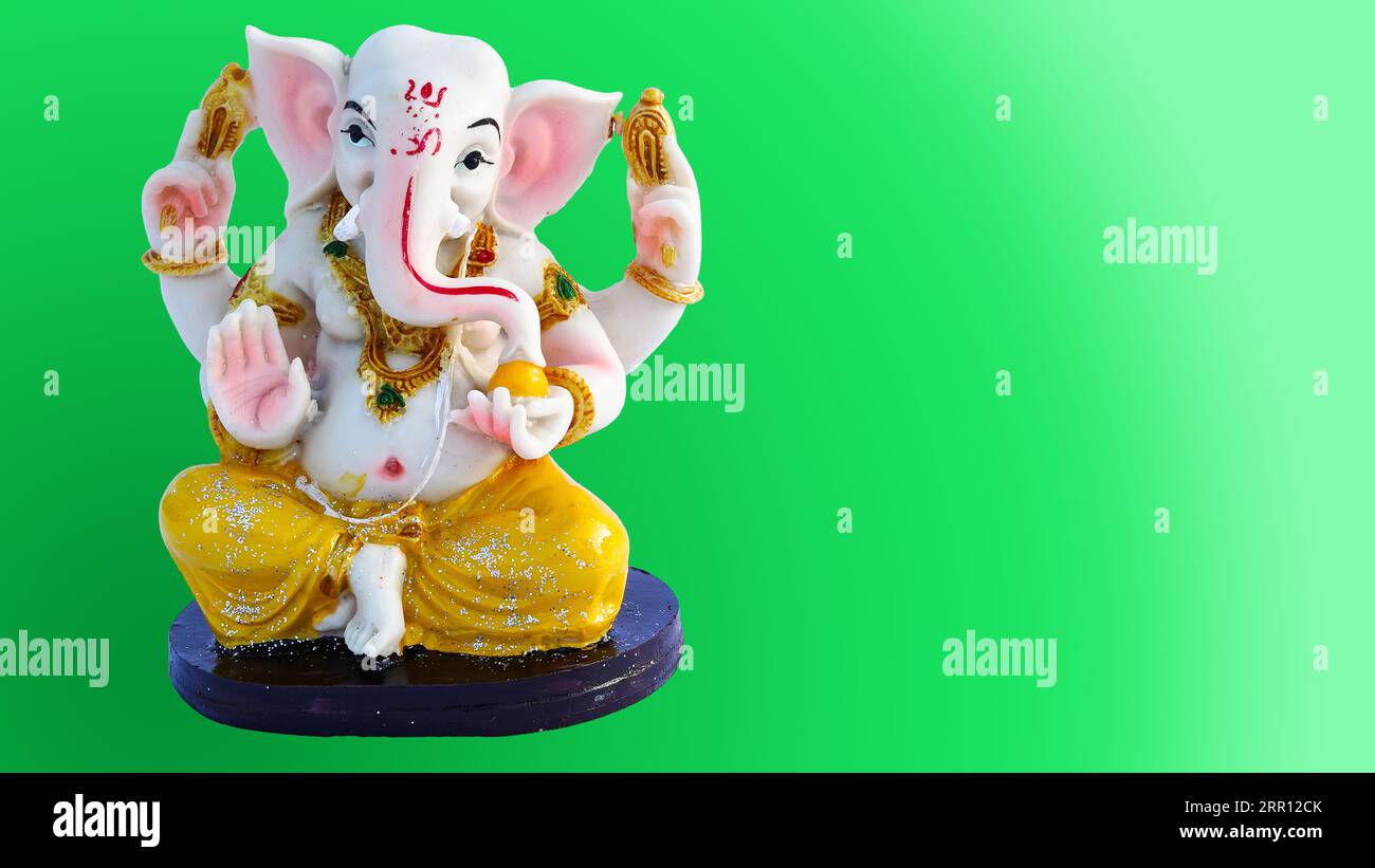 Ganesh Chaturthi Festival, Ganpati Statue mit schöner Textur auf grünlichem Hintergrund, Lord Ganesha ist der hinduistische Gott des Erfolgs. Stockfoto