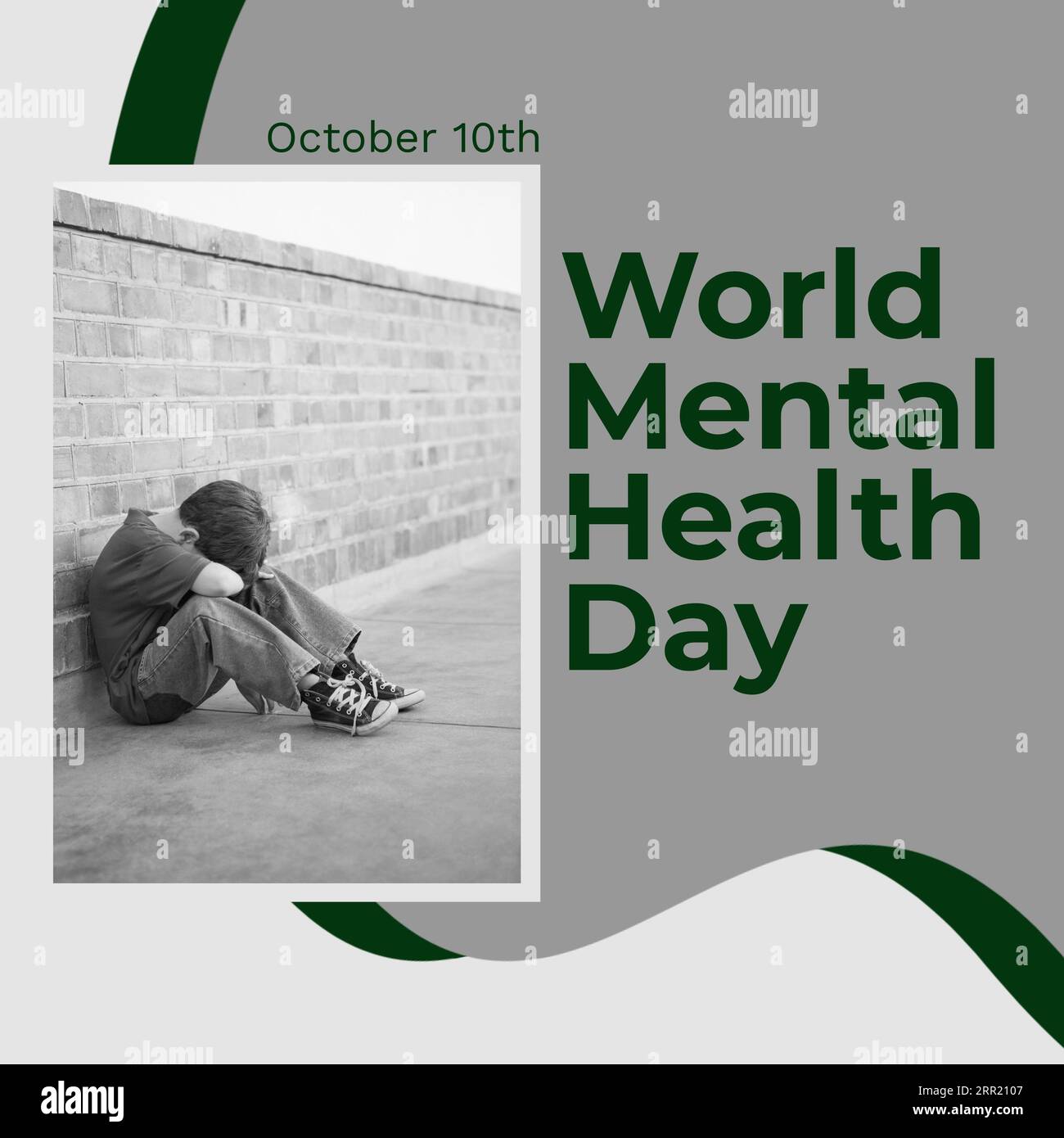 Composite aus World Mental Health Day Text over sad kaukasian Boy Stockfoto