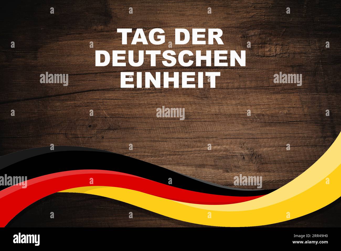 Deutschland Tag der Einheit 3. Oktober. Text auf einer Webflagge Deutschlands. Tag der Deutschen Einheit. Stockfoto