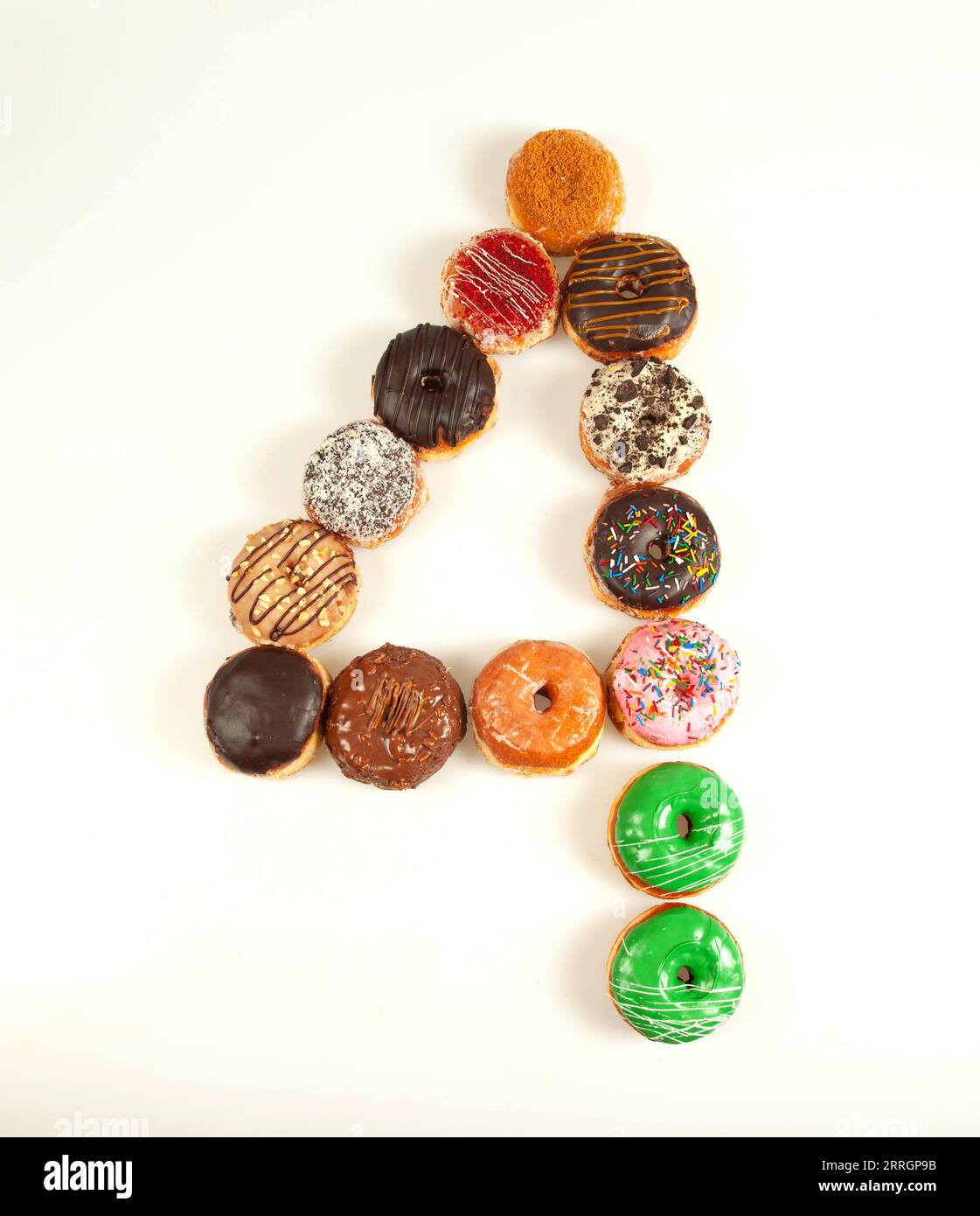 Nummer-vier-Formation mit vielen bunten Brioche-Donuts. Stockfoto