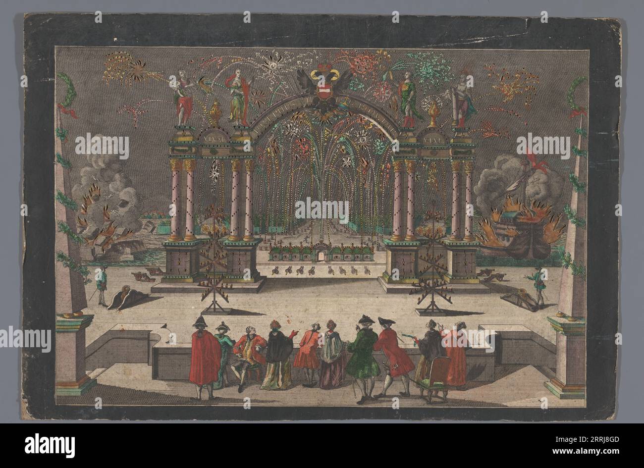 Blick auf das Feuerwerk und einen Triumphbogen mit einem zweiköpfigen Adler und dem Namen Josephs II., deutscher Kaiser, 1765-1799. Im Hintergrund auf der linken Seite wird eine Struktur aufgelöst. Rechts brennt ein Schiff. Stockfoto