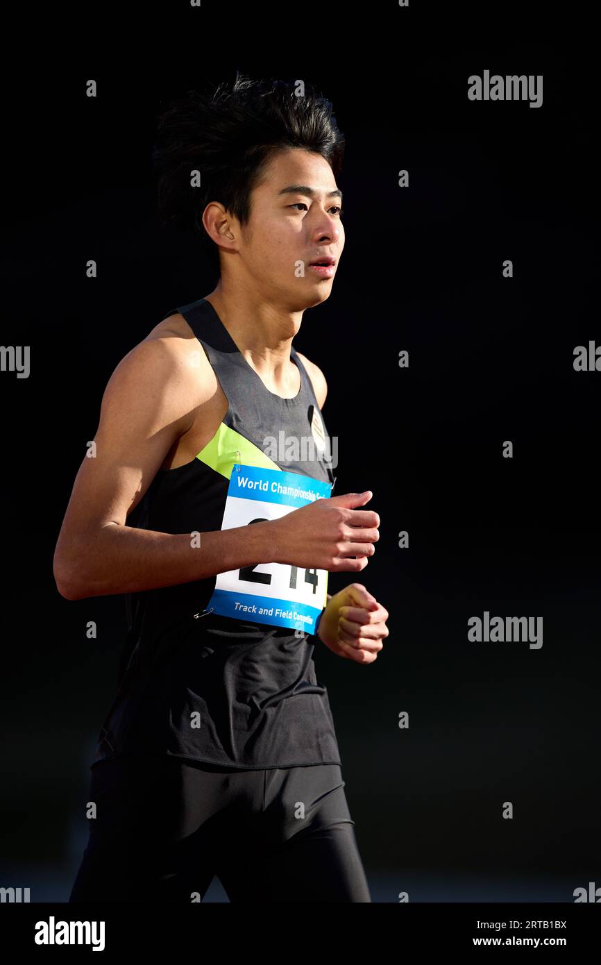 Japanische Sportler läuft auf Strecke Stockfoto