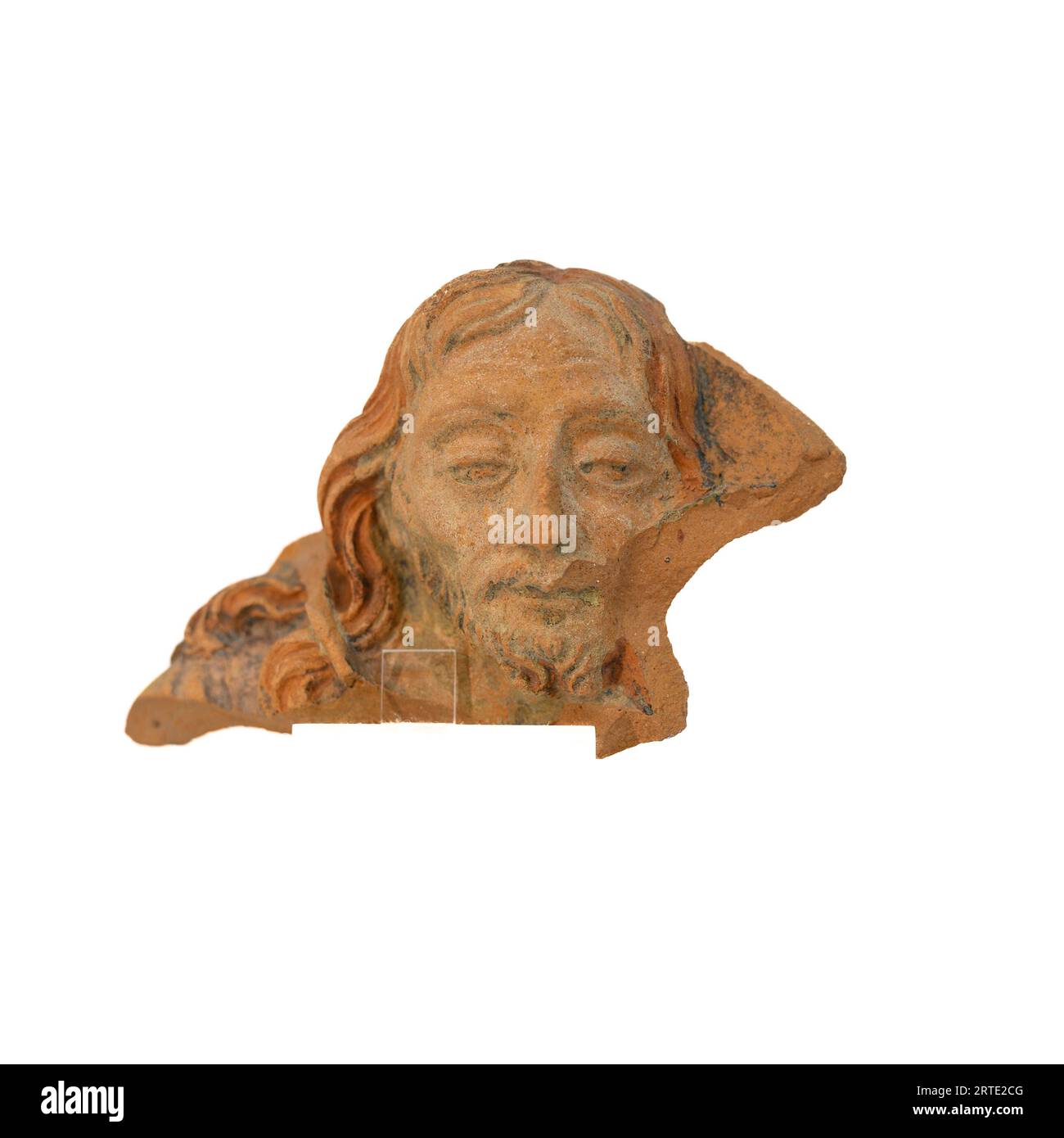 Head of Christ – ein appliziertes Element. Keramik in Halbform geformt. 18. Jahrhundert. Expo im Schloss São Jorge, Lissabon, Portugal. [artikel: CSJ 4556] Stockfoto
