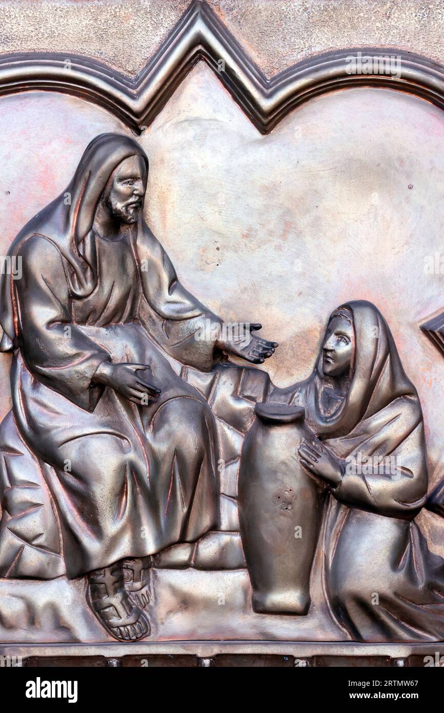 Song Vinh katholische Kirche. Jesus und die Frau Samarias am Brunnen. Vietnam. Stockfoto