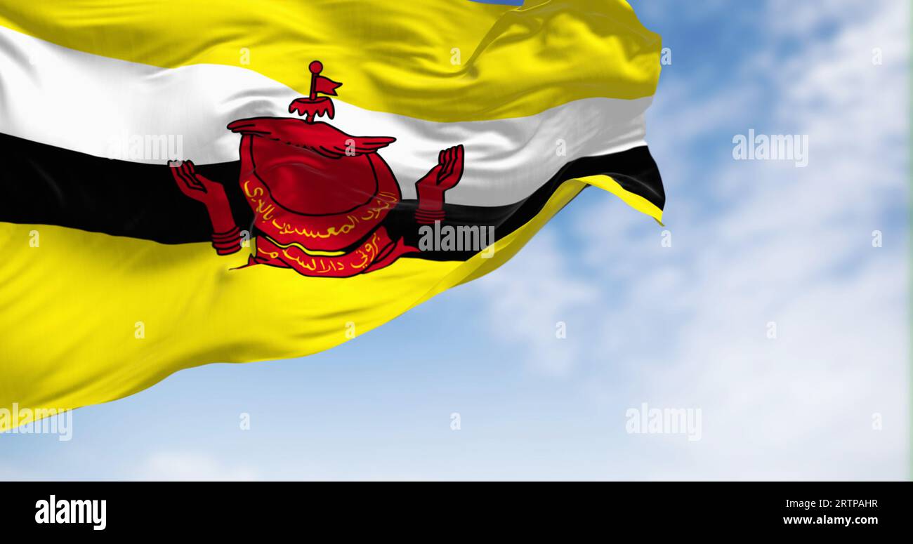 Nationalflagge von Brunei, die an klaren Tagen im Wind winkt. Brunei Darussalam ist ein Land in Südostasien. 3D-Illustrations-Rendering. Flatternder fa Stockfoto