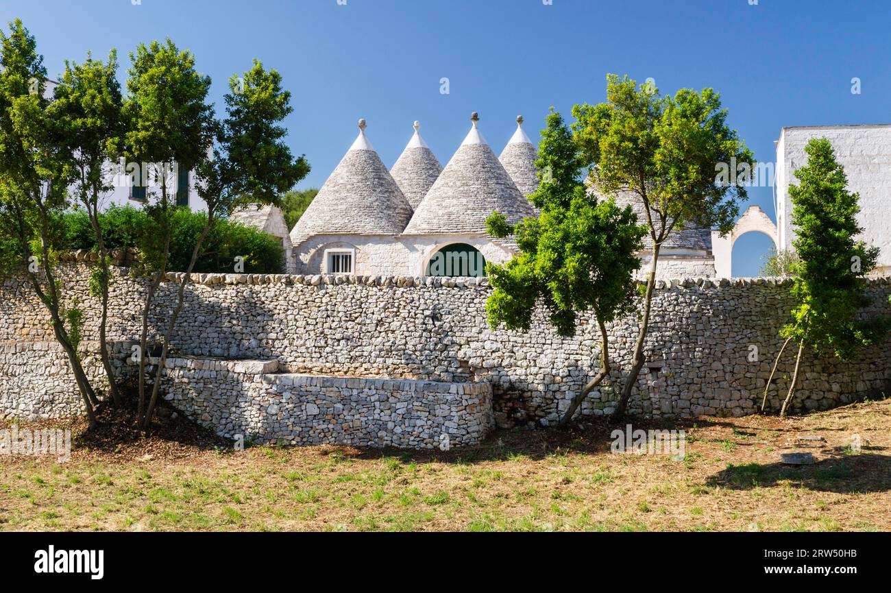 Trullo, Trulli, traditionelle Rundhäuser, Steinmauer, Martina Franca, Valle d'Itria, Trullo-Tal, Apulien, Apulien, Italien Trullo, traditionelle Runde Stockfoto