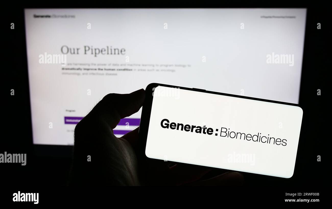 Person, die ein Mobiltelefon mit dem Logo des amerikanischen Biotechnologie-Unternehmens Generate Biomedicines auf dem Bildschirm vor der Webseite hält. Konzentrieren Sie sich auf das Display des Telefons. Stockfoto