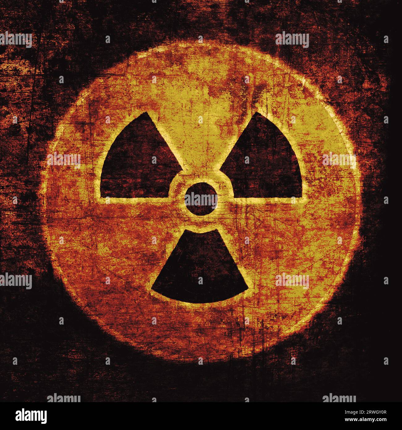 Strahlungszeichen, gelb auf schwarz. Emblem für nukleare Gefahren, grunge strukturiert. Symbol für radioaktive Bedrohung Stockfoto
