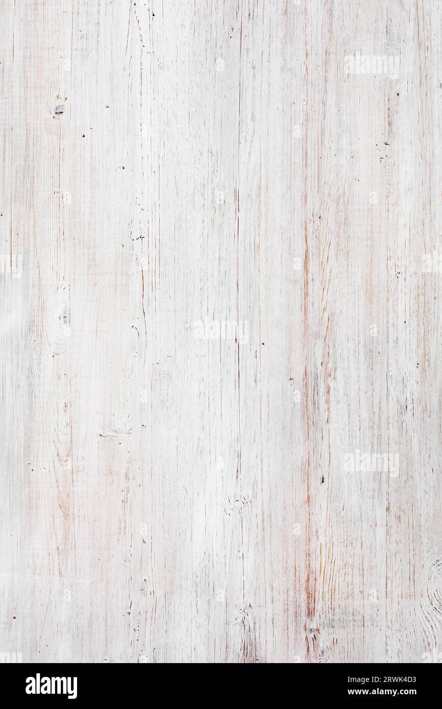 Abgenutztes, zerkratztes und schmutziges Holz, weiß lackiert Stockfoto