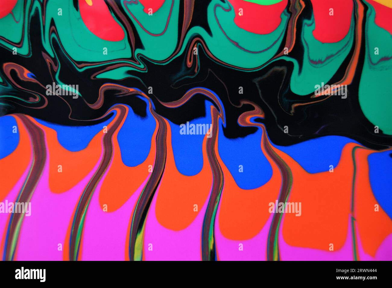 Flatternde, gemischte Farben. Einzigartiger abstrakter Hintergrund. Stockfoto