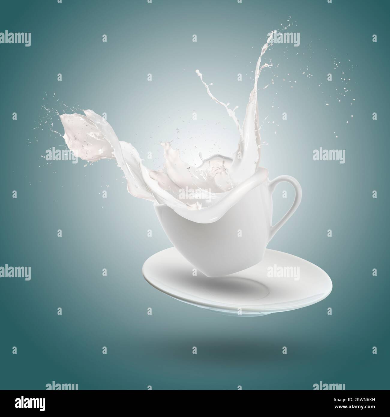 Milchwelle spritzt aus der Tasse auf blauem Hintergrund. Stockfoto
