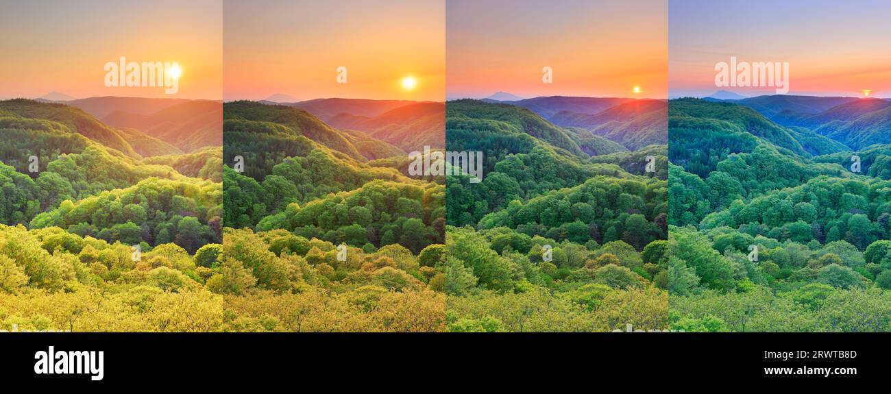 Das frische Grün des Jogakura Valley, Mt. Iwaki und die untergehende Sonne von der Jogakura Ohashi Brücke aus gesehen Stockfoto