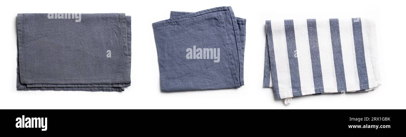Leinentextile Serviette isoliert auf weißem Hintergrund. Graue und blaue Baumwollservietten. Stockfoto