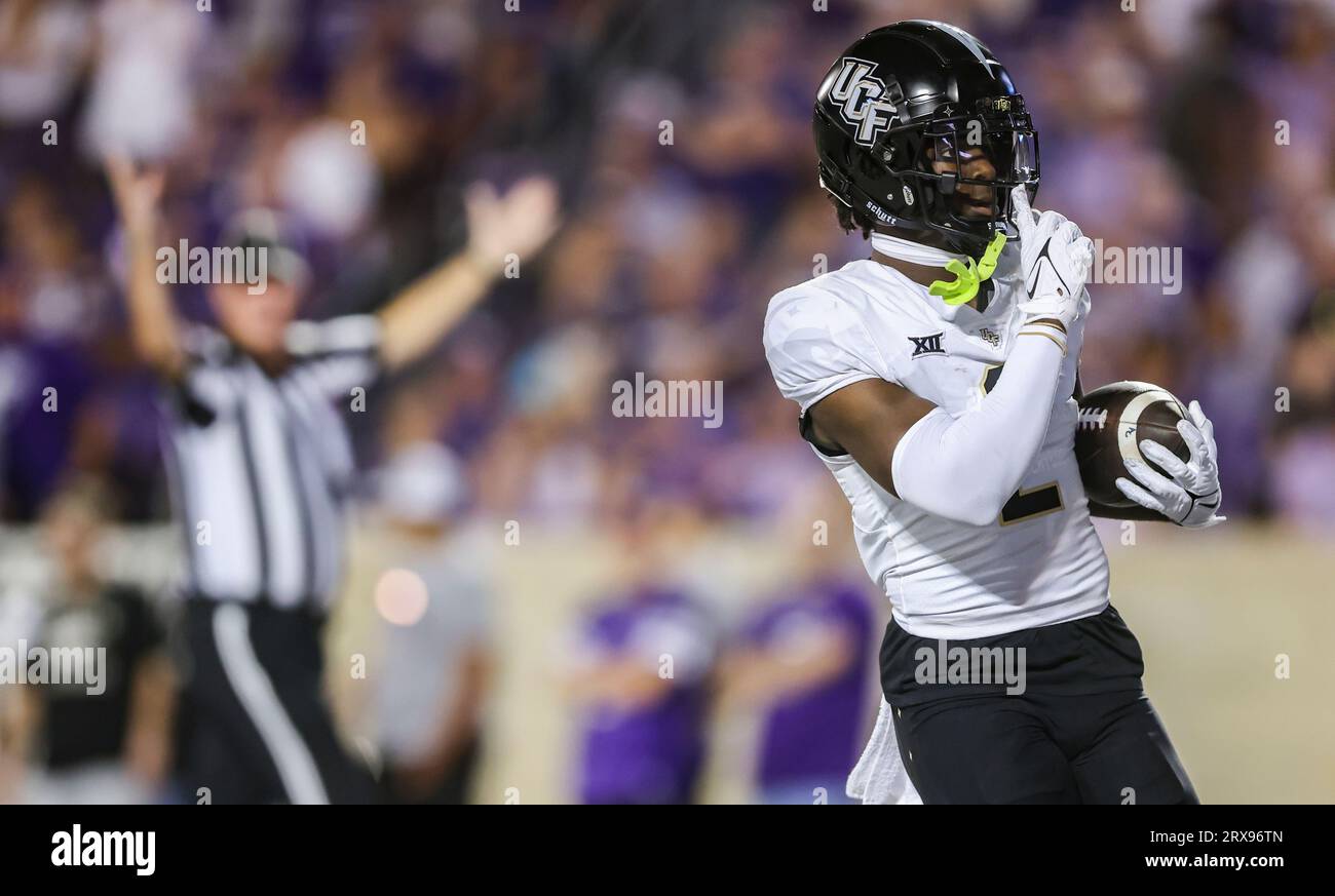 Central Florida wide receiver Kobe Hudson quiets the Kansas State crowd after scoring a touchdown on a trick play during the first half of an NCAA college football game on Saturday, Sept. 23, 2023, in Manhattan, Kan. (AP Photo/Travis Heying) Stockfoto