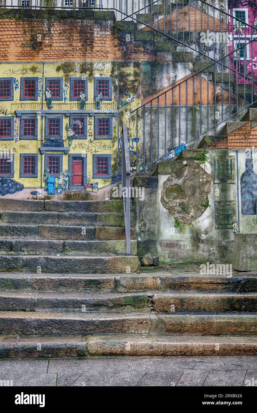 Amüsante lustige Straßenkunst auf einer Treppe in Gaia, Porto, Portugal, wo sich die Arbeiter in lustigen Positionen befinden. Beobachtungshumor. Stockfoto