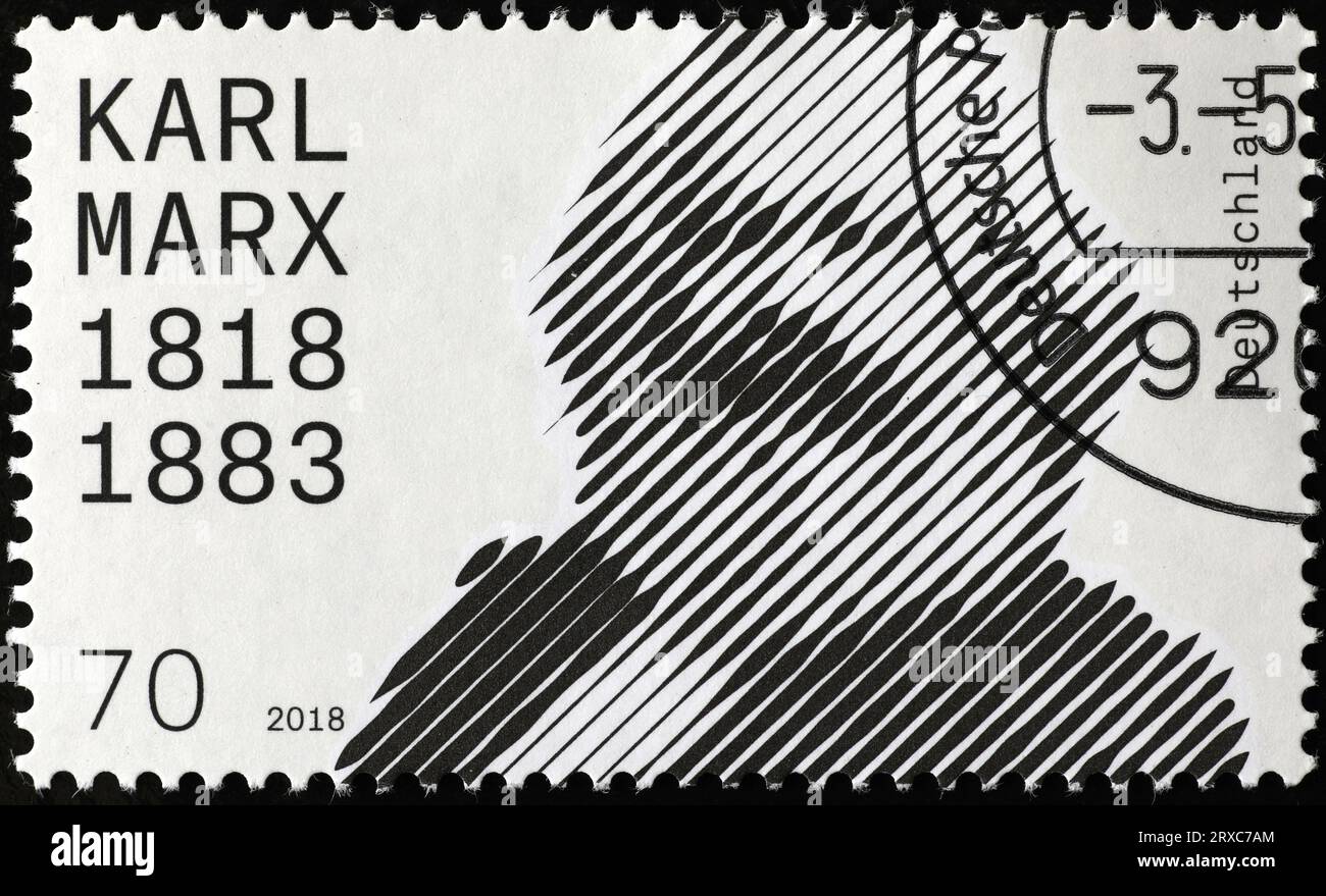 Stilisiertes Porträt von Karl Marx auf deutscher Briefmarke Stockfoto