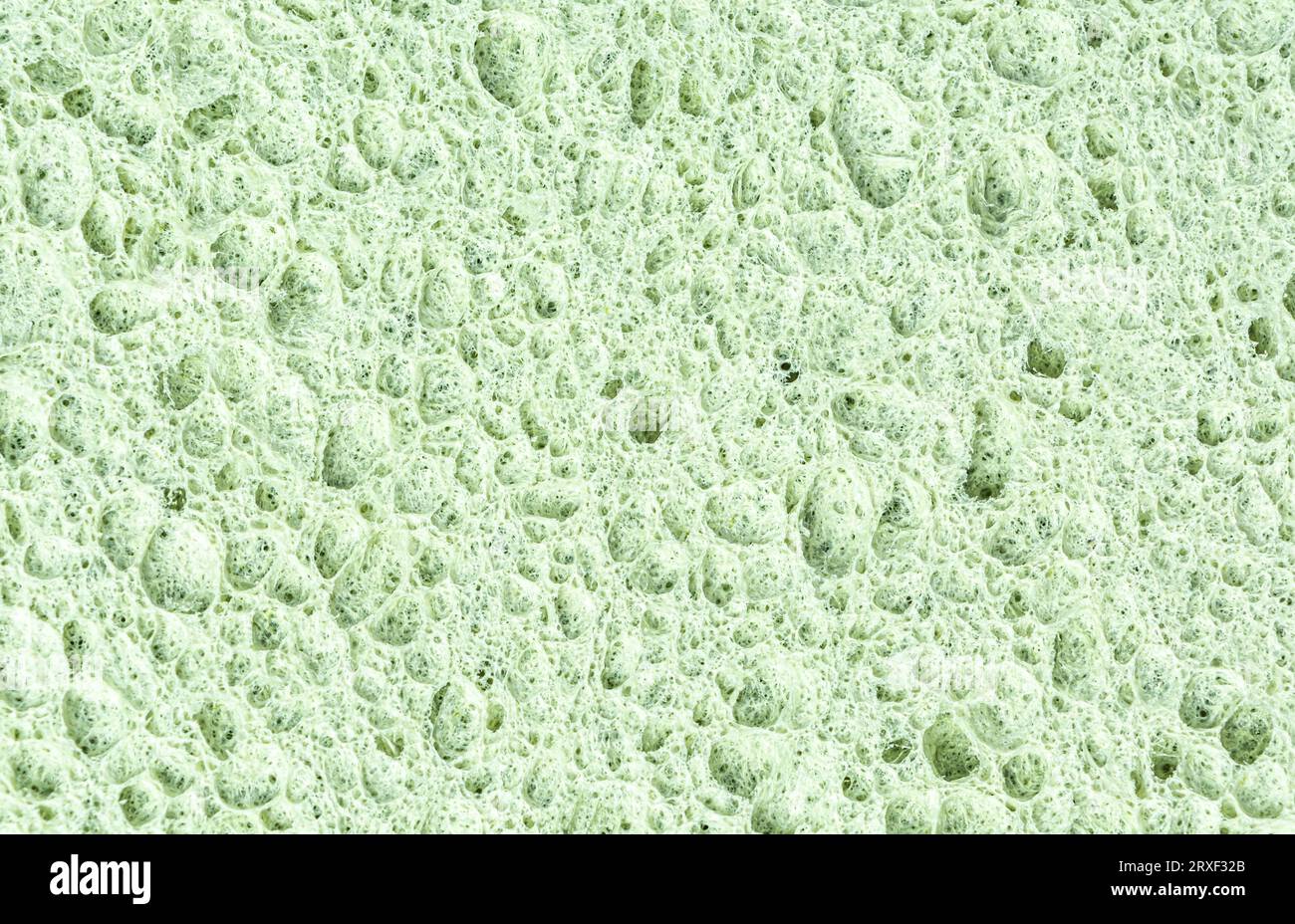 Poröser organischer Schwamm zum Waschen von Geschirr, Textur, Hintergrund. Hochwertige Fotos Stockfoto