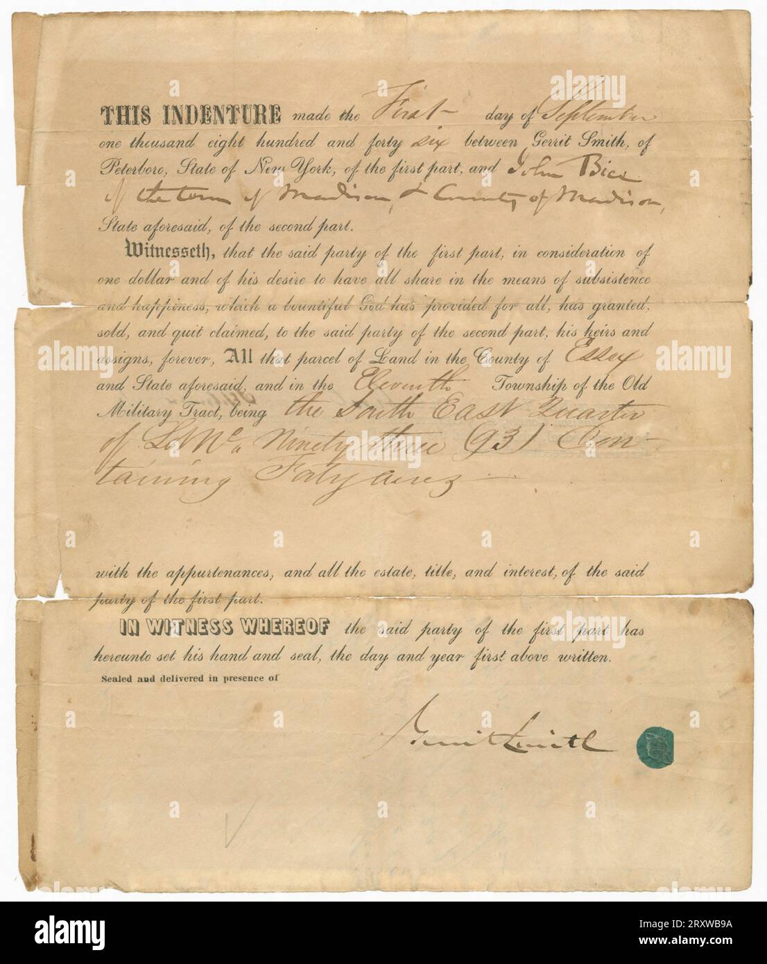Doppelseitige Landprothesen. Das Dokument enthält gedruckten und handschriftlichen Text, beide in schwarzer Tinte. Der Anfang steht [DIESE INDENTURE, machte den ersten Tag des Septembers / eintausendachthundertsechsundvierzig zwischen Gerrit Smith von Petersboro, Sate von New York, des ersten Teils, und John Bice(?) / Der Stadt Madison und des County of Madison, / vorgenannter Staat des zweiten Teils]. Die Indenture transferiert Land von Smith nach Bice. Das Dokument ist von Smith unten neben einem grünen Siegel signiert. Die Rückseite enthält eine gedruckte und handschriftliche Erklärung, die von [E. Holm Stockfoto