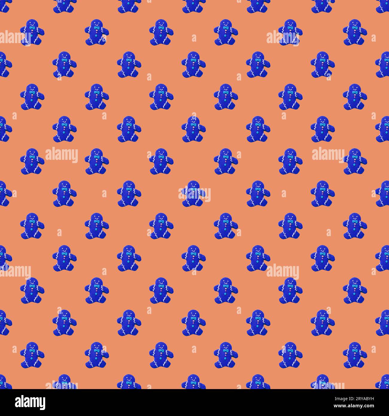 Nahtloses Muster von Pop Art Style lebendiges Blau Lebkuchen Mann Cookies auf Pink Orange Hintergrund Stockfoto
