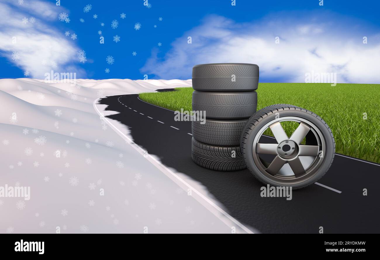 Reifen auf der Straße auf Gras und Schnee Stockfoto